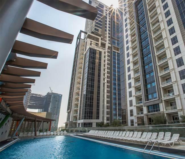 Higuests Vacation Homes - Executive Tower Dubai Bagian luar foto